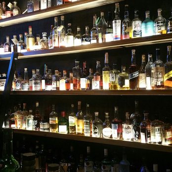 The Whiskey Bar - A large variety of whiskey at the main bar. - Whiskey Bars Near Me - Cleveland Heights, Ohio The Whiskey Bar - A large variety of whiskey at the main bar. - Whiskey Bars Near Me - Cleveland Heights, Ohio