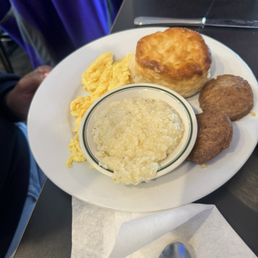 Eggs, grits, sausage patties, and biscuit Eggs, grits, sausage patties, and biscuit