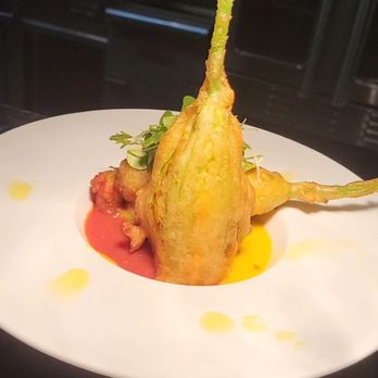 Il Professore Ristorante - Stuffed zucchini flowers w ricotta ,basil , Parmesan cheese , served w red and yellow tomatoes sauce - Italian Near Me - Tequesta, Florida Il Professore Ristorante - Stuffed zucchini flowers w ricotta ,basil , Parmesan cheese , served w red and yellow tomatoes sauce - Italian Near Me - Tequesta, Florida