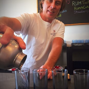 Chesapeake Bay Distillery - Chris pouring up a beautiful, icy cold vodka! Straight up so you know exactly how clean their vodka is. - Distilleries Near Me - Virginia Beach, Virginia