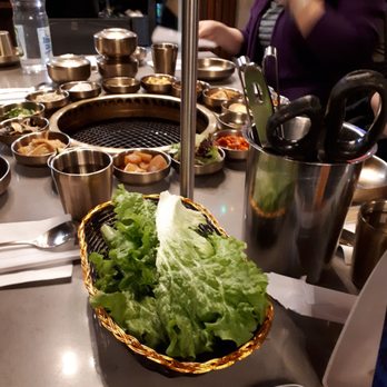 Kook Korean BBQ - Bowl of lettuce for wrapping the bbq meats and utensils for bbq-ing. - Korean Near Me - Vancouver, British Columbia Kook Korean BBQ - Bowl of lettuce for wrapping the bbq meats and utensils for bbq-ing. - Korean Near Me - Vancouver, British Columbia