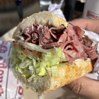 Sourdough & Co. - a person holding a sandwich - Sandwiches Near Me - Petaluma, California Sourdough & Co. - a person holding a sandwich - Sandwiches Near Me - Petaluma, California