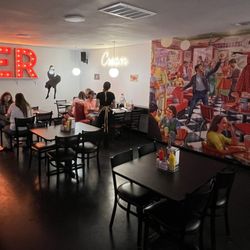 Cream Pies & Fries - Interior mural and dining area.