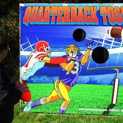 Quartback Toss, 7ft x 7ft frame game, includes 3 footballs.