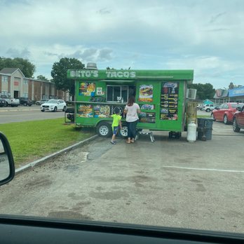 El Taco Town - a man and a woman standing in front of a food truck - Tacos Near Me - Pasadena, Texas
