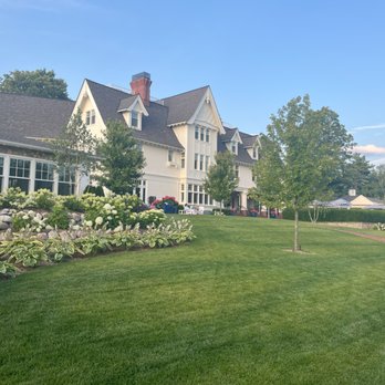 The Backyard - The main building of the Stonecliffe Inn. - Mediterranean Near Me - Mackinac Island, Michigan The Backyard - The main building of the Stonecliffe Inn. - Mediterranean Near Me - Mackinac Island, Michigan