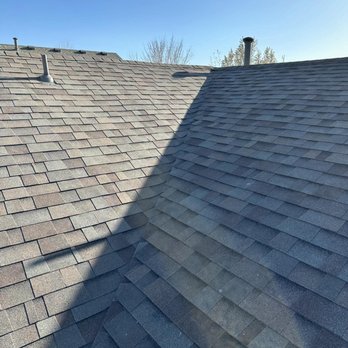 Advanced Construction Roofing - Asphalt shingle roof replacement due to hail damage in Aurora. Malarkey Vista Natural Wood. - Roofing Near Me