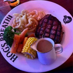 Hog's Australia's Steakhouse - Prime rib streak. Curly fries and veggies.