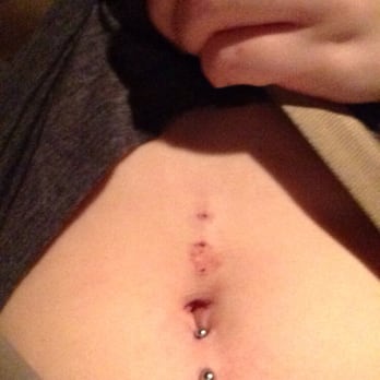 Mystic Marks Tattoo Co - This is the crooked belly piercing that was mention in the previous post. As you can see the holes are not even lined up. - Tattoo Near Me - San Marcos, Texas Mystic Marks Tattoo Co - This is the crooked belly piercing that was mention in the previous post. As you can see the holes are not even lined up. - Tattoo Near Me - San Marcos, Texas