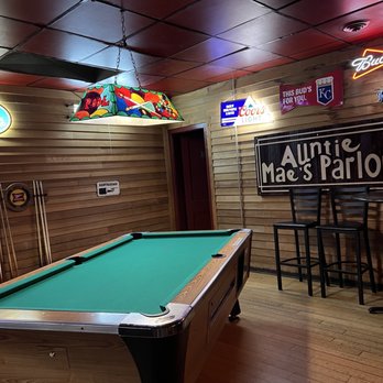 Auntie Mae's Parlor - a pool table and neon signs - Music Venues Near Me - Manhattan, Kansas