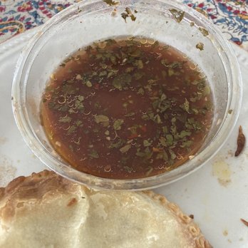 World Empanadas - Chimi was like a salad dressing. Mostly vinegar and dried parsley. And they charge for it. - Latin American Near Me - Burbank, California World Empanadas - Chimi was like a salad dressing. Mostly vinegar and dried parsley. And they charge for it. - Latin American Near Me - Burbank, California
