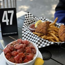 Seattle Fish Company - Cod fish and chips, tuna poke bowl (half reg, half spicy)