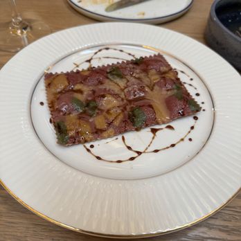 Camaraderie - Dauphine ravioli with comte cheese and caramelized onion - New American Near Me - Houston, Texas