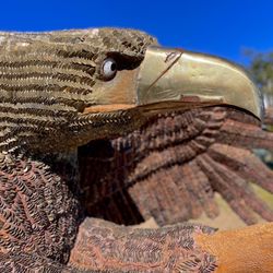 Sculpture in Civic Center Park Exhibition - "Prey" Made from pennies, nickels, and dimes from Burning Man