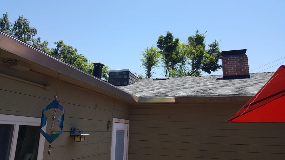 Slide of Green's Roofing