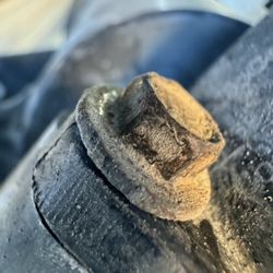 Phil Long Ford of Motor City - this is the bolt that holds in the blow off valve. It is 100% clear that nobody has had a wrench on this in a long time.