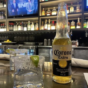 Doc B's Restaurant + Bar - A shot of tequila and a corona - New American Near Me - Chicago, Illinois Doc B's Restaurant + Bar - A shot of tequila and a corona - New American Near Me - Chicago, Illinois