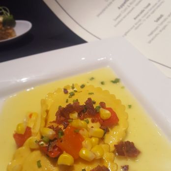 Seasons 52 - Sweet corn & ricotta ravioli, topped with applewood bacon - New American Near Me - Altamonte Springs, Florida