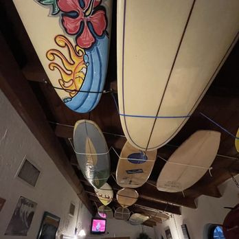 Slow and Low Bar B Que - ows surfboards hanging from the ceiling - American Near Me - Cocoa Beach, Florida Slow and Low Bar B Que - ows surfboards hanging from the ceiling - American Near Me - Cocoa Beach, Florida