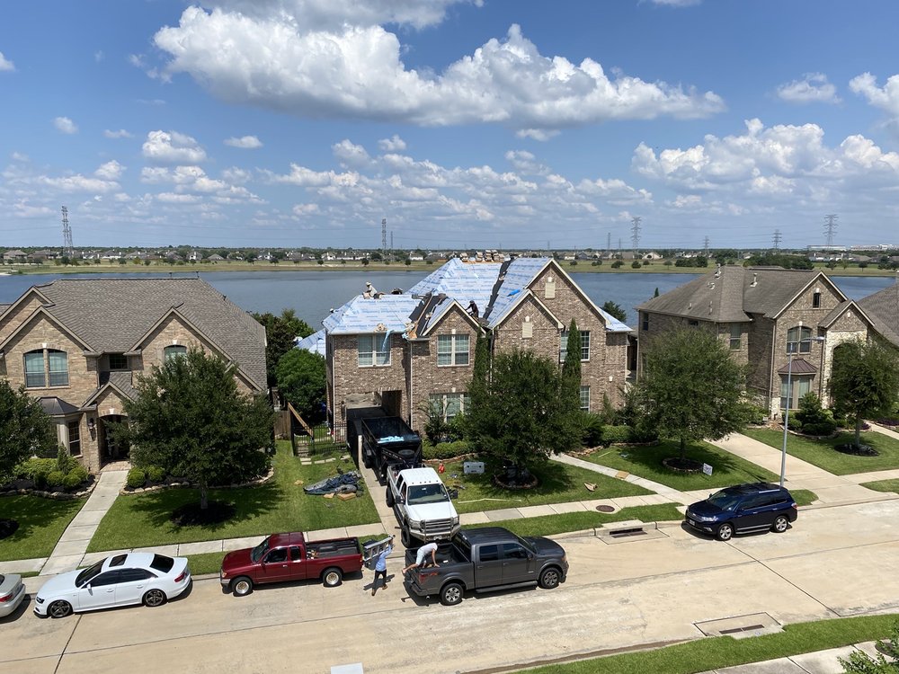 Slide of Moss Roofing Houston