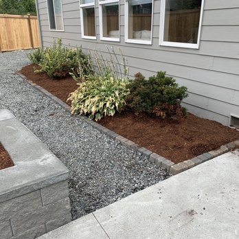 Doan's Gardener And Landscape - Retainer around flower beds. - Landscaping Near Me