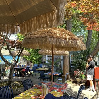 Aplaya Kitchen & Tiki Bar - Seating is all outdoor - on a very hot day it was still comfortably cool and completely shaded - Tiki Bars Near Me - Chatham, Massachusetts