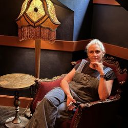McMenamins Grand Lodge - Daughter enjoying a sit in the attic. Check out that fabulous lamp!