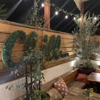 Side Yard Public House - Darling patio with beautiful plants, olive tree and white lights everywhere - Sports Bars Near Me - Escondido, California Side Yard Public House - Darling patio with beautiful plants, olive tree and white lights everywhere - Sports Bars Near Me - Escondido, California