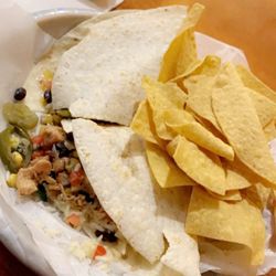 Bubba Ritos - Chicken quesadilla w/rice, black beans, jalapeños, sour cream, and Bubba's caviar