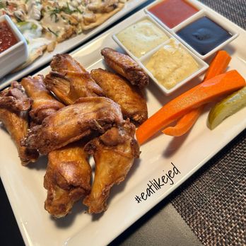 IVR Bar - CHICKEN WINGS plain with sauces in the side since we wanted to try all the sauces. - Bars Near Me - Milwaukee, Wisconsin