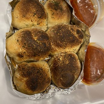Grandmas NY Pizza - a tray of buns and sauces - Desserts Near Me - Cumming, Georgia