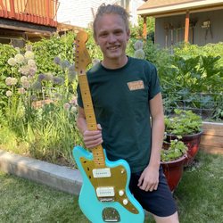 Guitar Czar - Sea foam beauty with a gold anodized pick guard? Yes please.