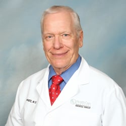 William E White, MD