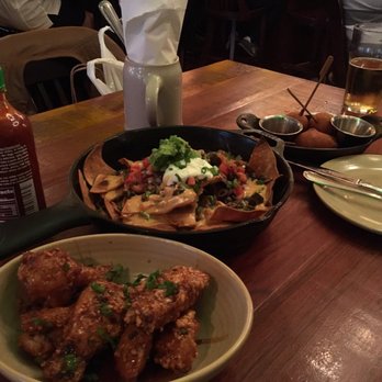 Tavern Hall - Chicken wings, Stadium nachos, mini corndogs - all happy hour! - New American Near Me - Bellevue, Washington Tavern Hall - Chicken wings, Stadium nachos, mini corndogs - all happy hour! - New American Near Me - Bellevue, Washington