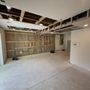 Photo of Green and Gold Painting and Drywall