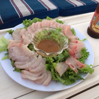Kainani Sails Maui Sailing Charters - Captain Keao sashimi'd our fish for us!  Ocean to table. - Sailing Near Me