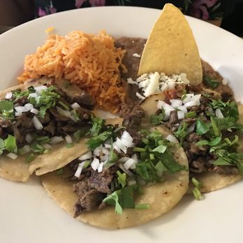 Gorditas Don Huicho - Friend ordered steak tacos With rice and beans on the side - Mexican Near Me - Clearwater, Florida Gorditas Don Huicho - Friend ordered steak tacos With rice and beans on the side - Mexican Near Me - Clearwater, Florida