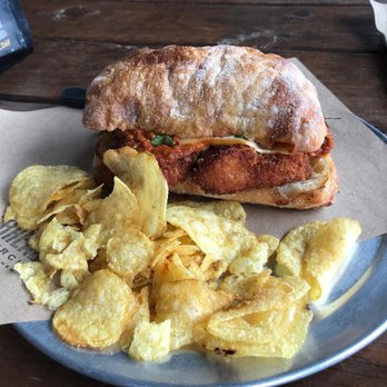 Bread & Circus Sandwich Kitchen - Pork Parm sandwich with potato chips - Sandwiches Near Me - Sioux Falls, South Dakota Bread & Circus Sandwich Kitchen - Pork Parm sandwich with potato chips - Sandwiches Near Me - Sioux Falls, South Dakota