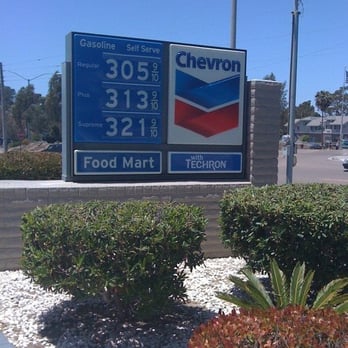 Chevron - a gas station sign with a gas station in the background - Gas Stations Near Me - Cardiff, California Chevron - a gas station sign with a gas station in the background - Gas Stations Near Me - Cardiff, California