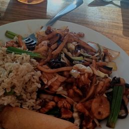 Hot Garlic Chicken and an egg roll Hot Garlic Chicken and an egg roll