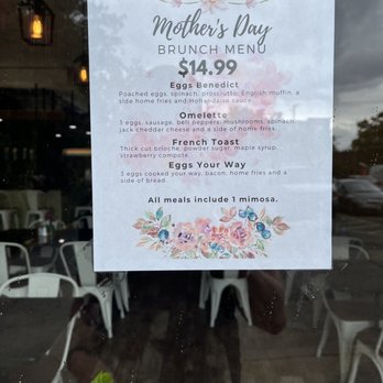 Mama Chepa - a sign in the window of a restaurant - Latin American Near Me - Washington, DC, District of Columbia