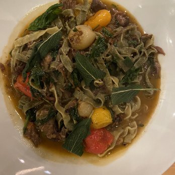 Bellwether - Ox Tail Ragu, with pearl onions, blistered tomatoes on fresh linguine. - Cocktail Bars Near Me - Jacksonville, Florida Bellwether - Ox Tail Ragu, with pearl onions, blistered tomatoes on fresh linguine. - Cocktail Bars Near Me - Jacksonville, Florida