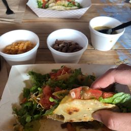 Brisket tacos, rice, pinto beans and green chili!