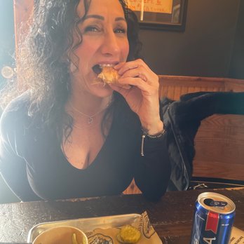 Ray Brothers Barbeque - Patty enjoying her pulled pork Carolina sauced bar-b-que - Barbeque Near Me - Bouckville, New York
