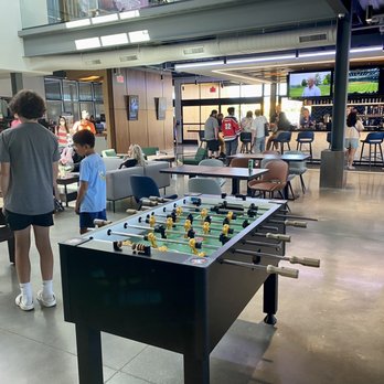 Topgolf - The first floor has free fooseball and air hockey - Sports Bars Near Me - Renton, Washington Topgolf - The first floor has free fooseball and air hockey - Sports Bars Near Me - Renton, Washington