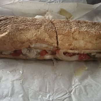 Potbelly - Chicken Mediterranean sandwich. I added tomato, mustard, oil and Italian seasoning. - Salad Near Me - Houston, Texas Potbelly - Chicken Mediterranean sandwich. I added tomato, mustard, oil and Italian seasoning. - Salad Near Me - Houston, Texas