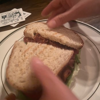 Blind Tiger Ale House - BLT splitting into 2 sandwiches for Yesi and I yummy - American Near Me - New York, New York