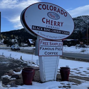 Colorado Cherry Company - a sign in the snow - Specialty Food Near Me - Lyons, Colorado