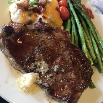 Chili's - Rib eye "medium rare" with loaded mashed potatoes and asparagus with tomatoes - Bars Near Me - Sacramento, California