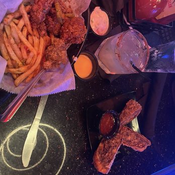 Fin & Feathers - Jerk Egg Rolls Chicken Thighs tossed with Honey Hot - Soul Food Near Me - Atlanta, Georgia